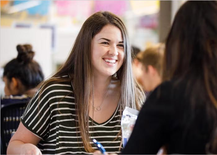 Students talking and laughing